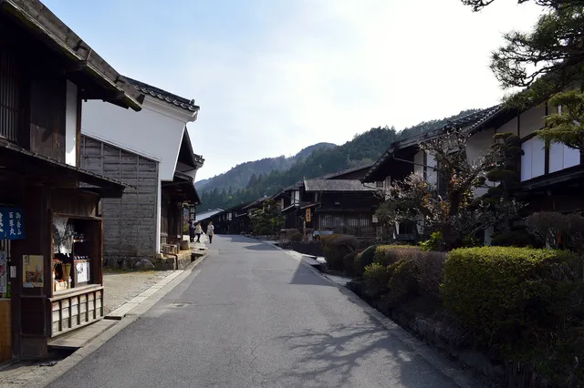 Preserved wooden Edo-period houses lining the stone-paved post road through Magome in the Kiso Valley