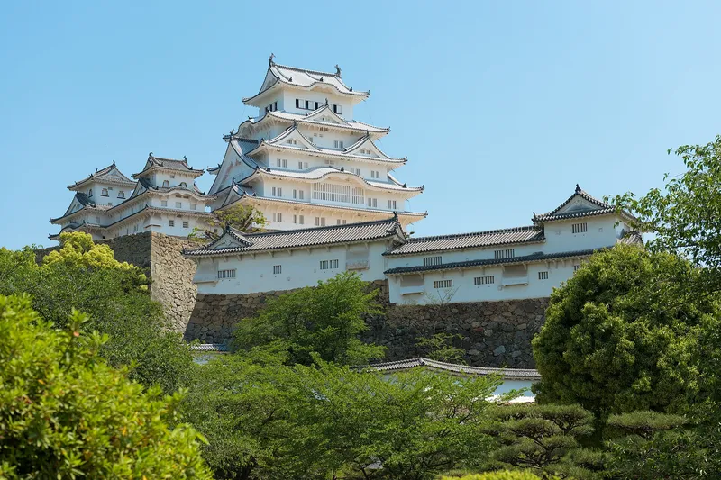 Himeji Castle's white six-story keep rising above its moats and roofs