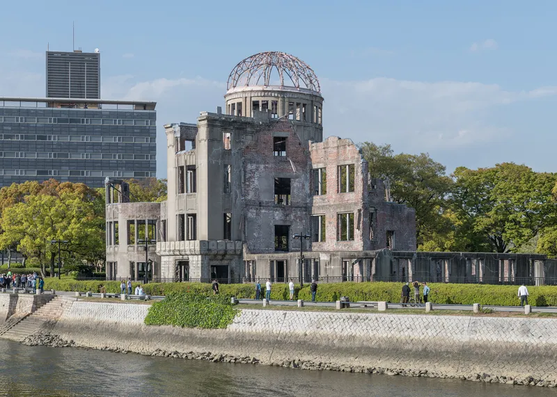 The A-Bomb Dome standing beside the Motoyasu River at the edge of Hiroshima Peace Memorial Park