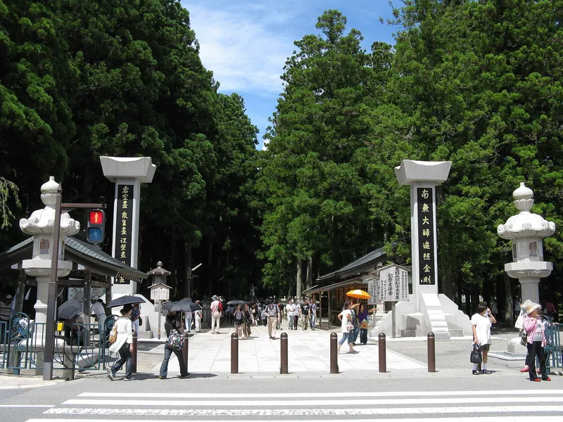 Okunoin's cedar-lined approach with rows of centuries-old moss-covered stone lanterns
